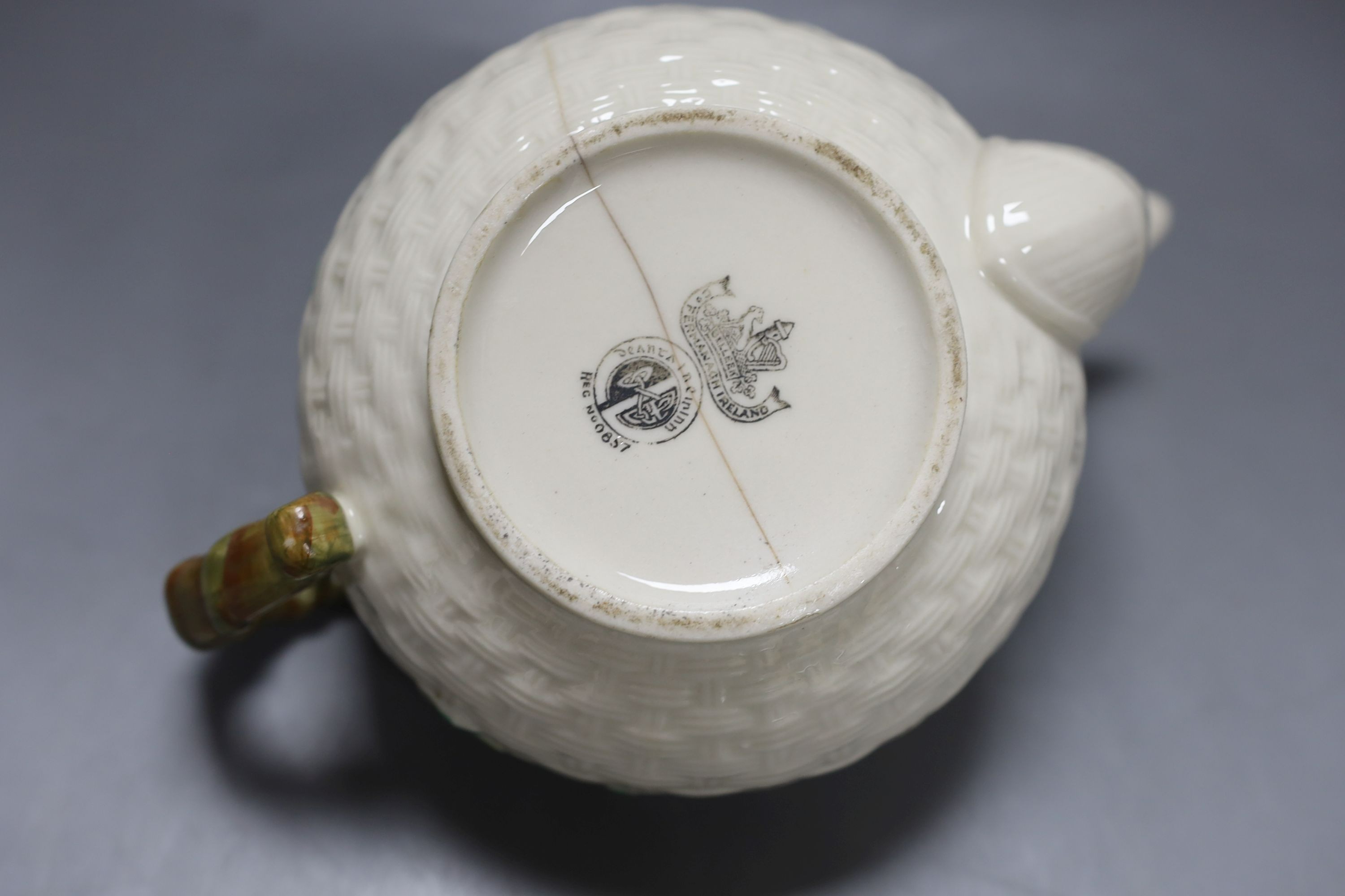 Matching Belleek sugar bowl milk jug and dish together with another Baleek cup and saucer and teapot (6)